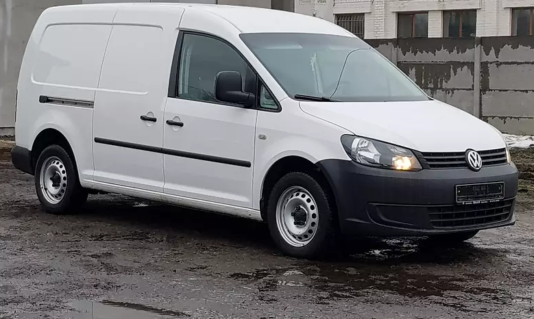 белый Кадди