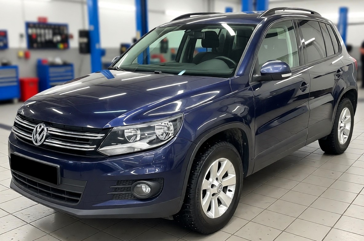 Фольксваген Тигуан после замены масла в автомастерской