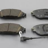 Комплект новых передних колодок