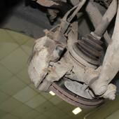 тормозной диск с суппортом на Пассате