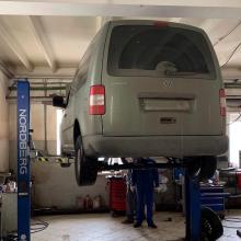 кадди в автосервисе на ремонте